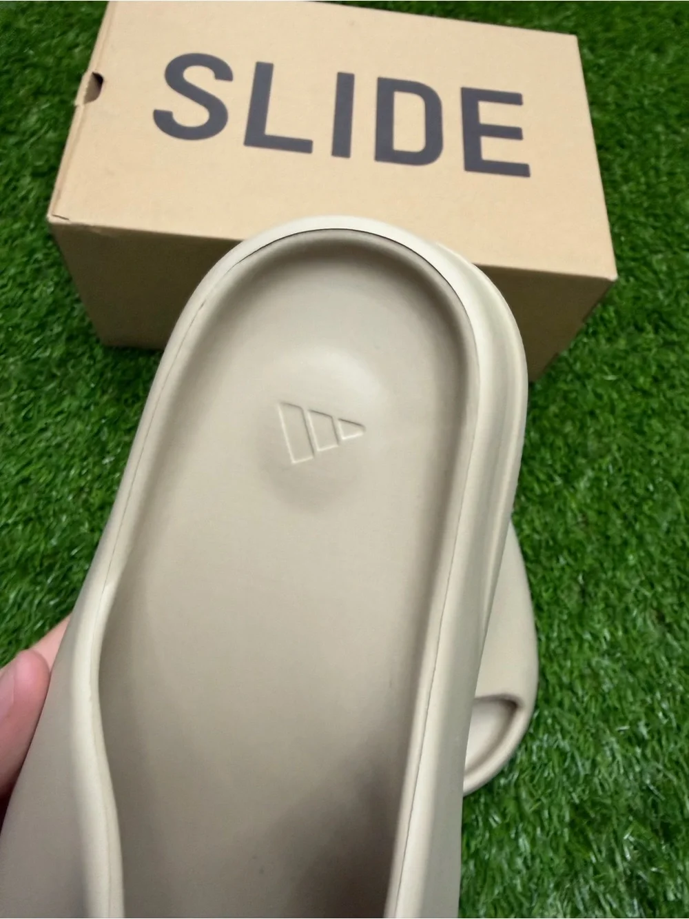 Adidas Yeezy slides “pure” colorway